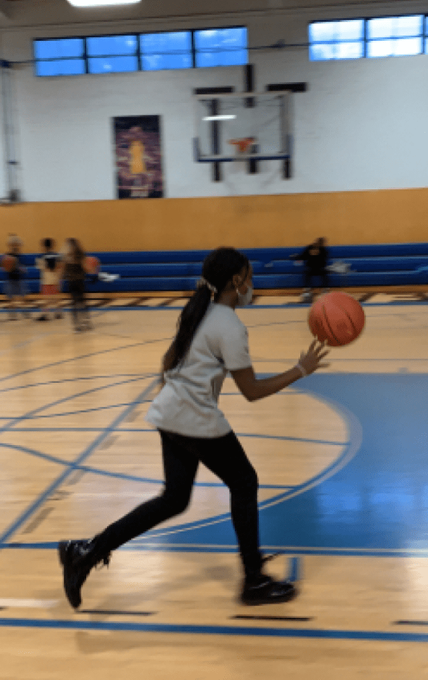 Girl Playing Basketball